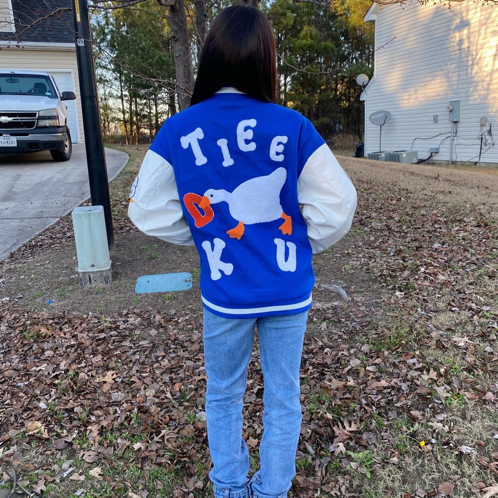 Blue and white varsity jacket from Aelfric Eden